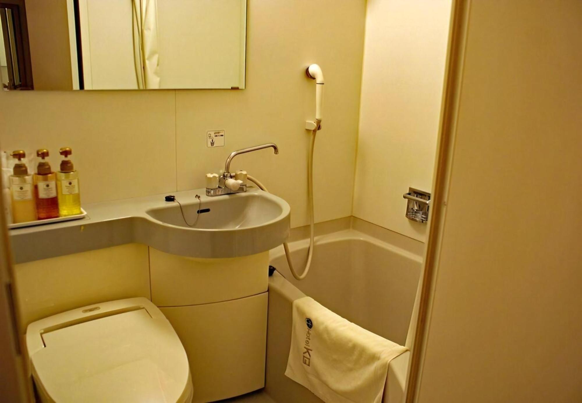 אויטה Business Hotel Kg מראה חיצוני תמונה
